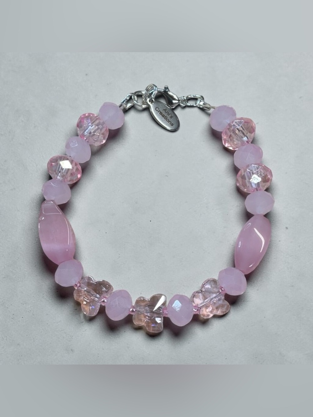 Handcrafted Pink Crystal, Cats Eye and Butterfly Bracelet